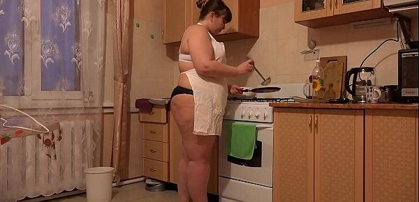  The fat girl prepares in panties and then removes them.